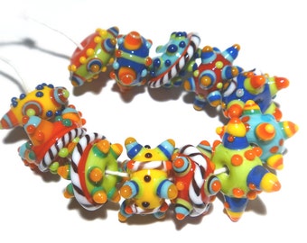 PINATA PATROL Handmade Lampwork Beads Yellow Blue Ivory Green Crazy Spiky Shapes Whimsical  Set of 12