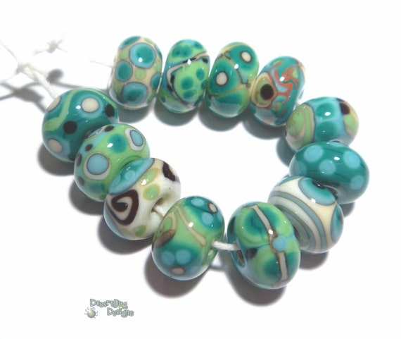 TEMPEST TUMBLERS Handmade Lampwork Beads - Ivory Turquoise Blue Green Teal  Black - 12 Detailed Cool Beads - Desert Bug Designs