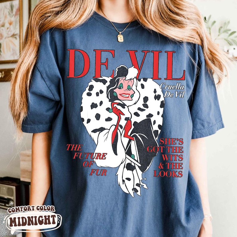 May include: A white ceramic mug with a black handle and the text "But First, Coffee" in a bold, black font. The mug is set against a blurred background, suggesting a cozy setting. The mug appears to be approximately 4 inches tall.