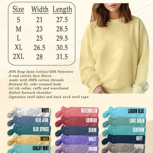 May include: A light yellow sweatshirt with a crew neck. The image includes a size chart with measurements in inches and a color palette featuring white, blue, red, and green hues. The text on the image reads "SWEATSHIRT COMFORT COLORS 1566".