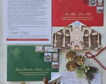 May include: A collection of Christmas-themed stationery including a letter from Santa Claus, two envelopes with North Pole stamps, a Nice List certificate, a wax seal stamp, three wax seals, and a string of red beads with gold pinecone accents.