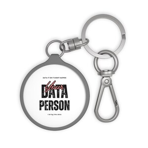 May include: A silver keyring with a round charm that says "Data it or it didn't happen Your Data Person I bring the data".