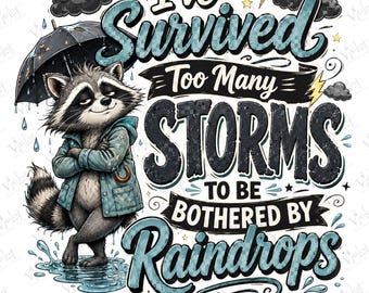 May include: A graphic illustration of a raccoon wearing a blue raincoat and holding a black umbrella, standing in a puddle. The text reads: I've Survived Too Many STORMS TO BE BOTHERED BY RAINDROPS. The design includes dark clouds and yellow lightning bolts.