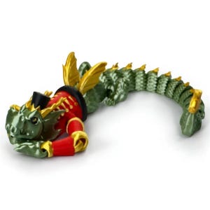May include: A whimsical dragon figurine with a green body, gold accents, and a red jacket. The dragon wears a black top hat and has a curved tail. The figurine is designed to resemble a nutcracker.