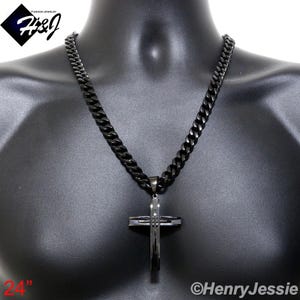 May include: A black stainless steel chain necklace with a black cross pendant. The chain is 24 inches long and has a curb link design. The cross pendant has a black finish and a grooved design.