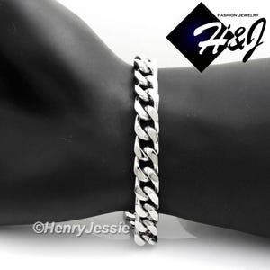 May include: A silver-colored curb chain bracelet. The bracelet is made of interlocking links and is displayed on a dark surface. The image includes the text "Fashion Jewelry H&J" and the copyright notice "©HenryJessie".