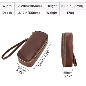 May include: A brown leather clutch with a gold zipper and wrist strap. The clutch is rectangular, measuring 7.28 inches (185mm) wide, 3.35 inches (85mm) high, and 2.17 inches (55mm) deep. The weight is 179g.