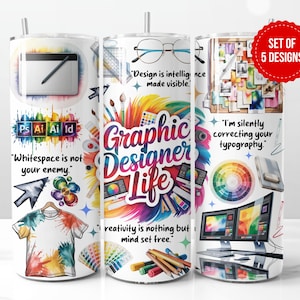 May include: A set of five graphic design-themed tumblers. Each tumbler features a different design with colourful illustrations of design tools, software logos, and inspirational quotes. The tumblers are white with a silver straw.