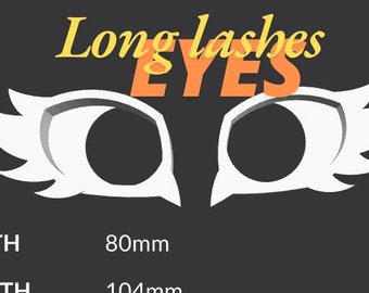 May include: White paper craft eyes with long lashes, labelled "Long lashes EYES". The eyes are 80mm wide and 104mm long.