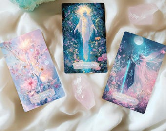 May include: Three tarot cards on a white fabric background. The cards are "Ace of Wands", "The Hanged Man", and "King of Swords". The cards are surrounded by pink and blue crystals.