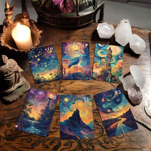 May include: Six tarot cards with colorful, swirling, starry night sky backgrounds. The cards are numbered 16, 17, 18, 20, 21, and 22. The cards feature images of a bird, a tower, a waterfall, a mountain, and a road.