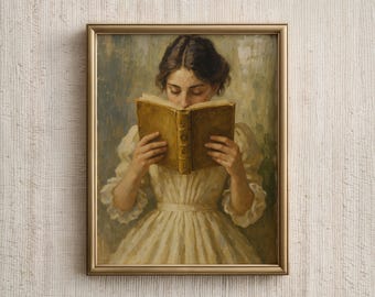Puede incluir: Pintura vintage enmarcada que representa a una mujer leyendo un libro. La mujer lleva un vestido color crema. El libro está abierto, con una cubierta dorada. La pintura está en un marco dorado.