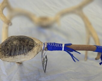 Turtle shell rattle with quartz.