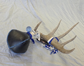 4 panel dyed buffalo rattle with antler handle and lead crystal.