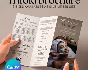 May include: A trifold brochure for Silk & Skin Lounge, featuring text and images. The brochure is held by hands and includes details about services, opening hours, and contact information. The design is in neutral tones with a spa theme.