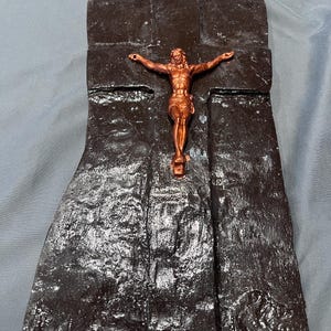 The old wood cross with crucifixion.