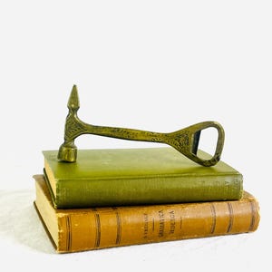 Vintage Brass Bottle Opener with Hammer End and Etching