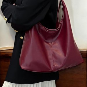 Vegane Leder Umhängetasche für Damen - weiche, stilvolle & geräumige Hobo-Tasche, perfekt für den täglichen Gebrauch. In verschiedenen Farben erhältlich.