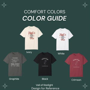 May include: A color guide for t-shirts featuring different color options for the design "Shull's Bay" and "Feeling Starry". The colors shown are ivory, white, graphite, black, and crimson.
