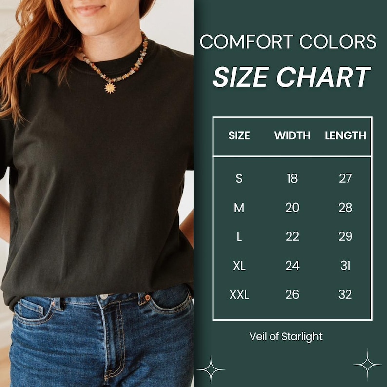 May include: Size chart for a t-shirt with measurements in inches. The chart shows the width and length of the shirt in sizes S, M, L, XL, and XXL. The text "Comfort Colors" and "Veil of Starlight" are also visible.