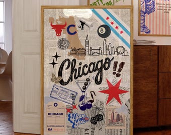 May include: A framed Chicago-themed collage with a red star, a bull, and the Chicago skyline. The word "Chicago!!" is written in black script. Other images include a butterfly, a martini glass, and a vintage airline ticket.
