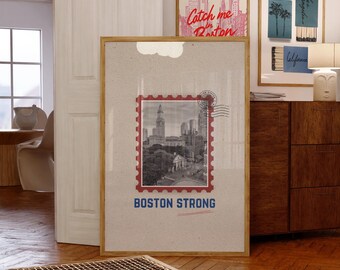 May include: A vintage-style poster with a black and white photo of the Boston skyline. The photo is framed by a red and white stamp with the words "Boston Strong" printed below. The poster has a beige background.