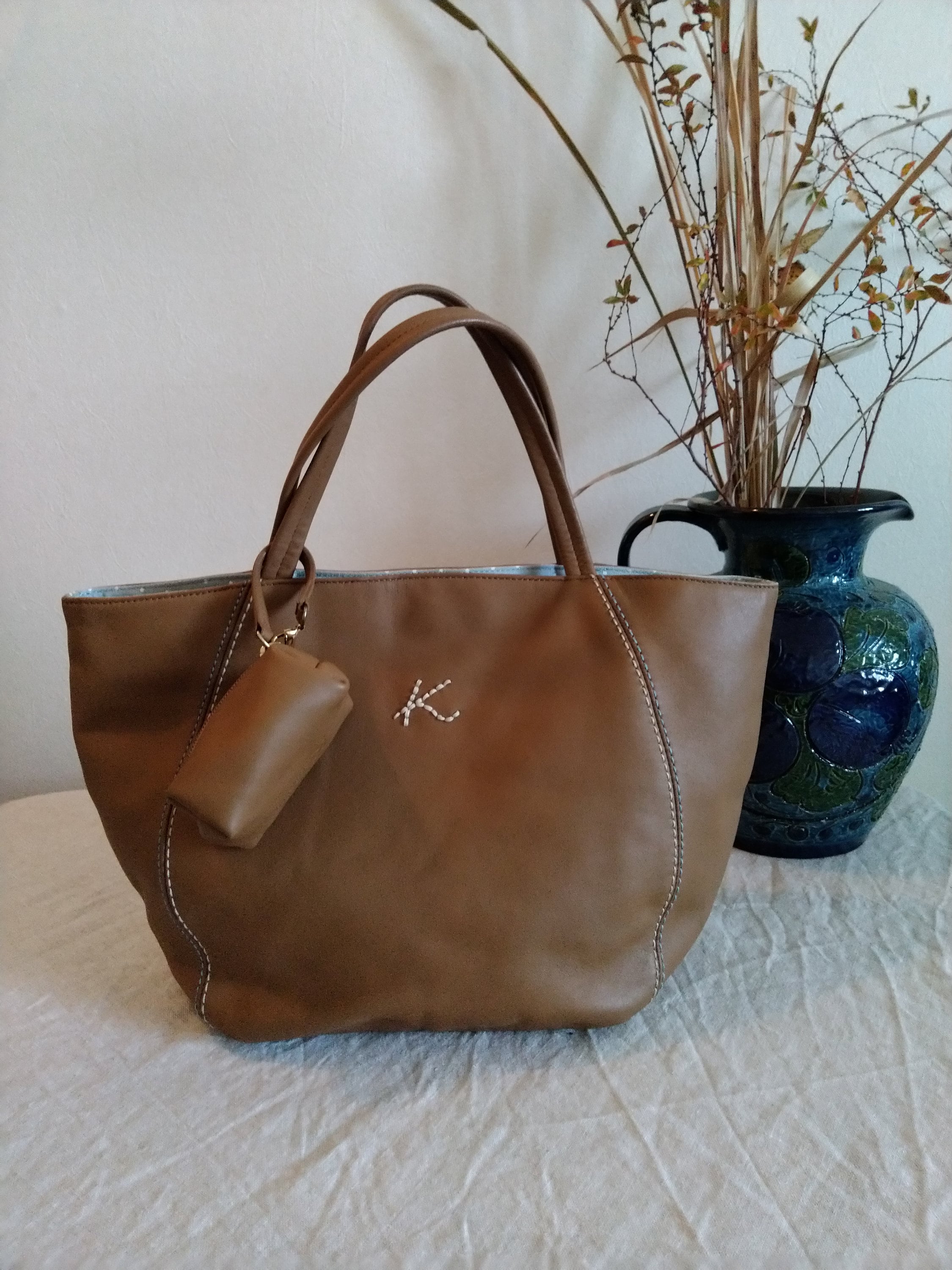 KITAMURA camel color small leather handbag. Cotton lining