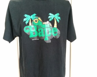 BAPE. Mens' T-shirt size JP Medium. Black logo print. Made in Japan.