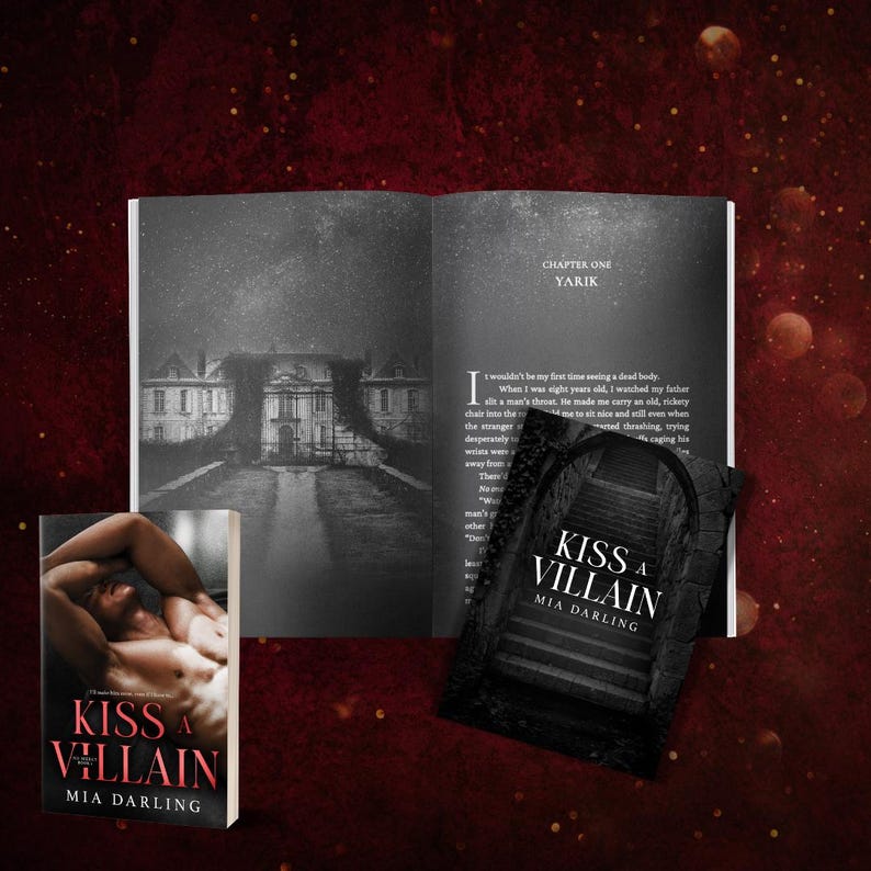 May include: A book cover with the title "Kiss a Villain" by Mia Darling. The cover features a dark, shadowy image of a grand house with a long driveway leading to the front door. The book is open to the first chapter, titled "Yarik".