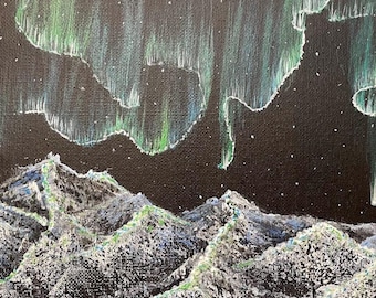 May include: An acrylic painting on canvas shows the aurora borealis above a mountain range. The night sky is black, with green and white streaks representing the aurora. The mountains are white, blue, and green.