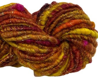 Super Bulky Handspun Yarn Sunset Song 58 yards red orange pink gold yellow Angelina glitz nylon firestar merino wool sparkly art yarn