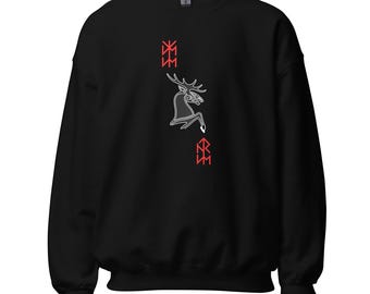 May include: Black sweatshirt featuring a white outline of a deer with antlers and red runic symbols. The design is vertically aligned on the front of the sweatshirt. The sweatshirt has a crew neck and long sleeves.