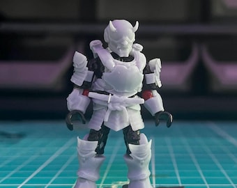 May include: White plastic action figure of a warrior wearing armor with horns on its helmet. The figure is standing on a black base.