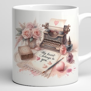 May include: White ceramic mug featuring a romantic design. The mug showcases a vintage typewriter, roses, and a handwritten note that reads "My heart belongs to you." The design includes hearts and ink bottles.