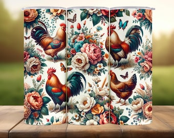May include: Three white insulated tumblers with a floral and rooster design. The design features colorful roosters, butterflies, and flowers in shades of red, pink, blue, and cream. The tumblers are displayed on a wooden surface.