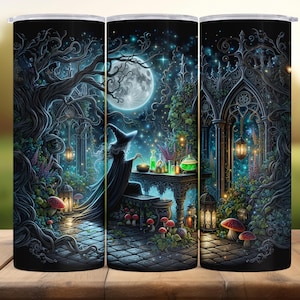 May include: A black tumbler featuring a fantasy scene with a witch in a long robe, a full moon, and a table with potions. The design includes trees, mushrooms, and a gothic archway, all in shades of blue, green, and purple.