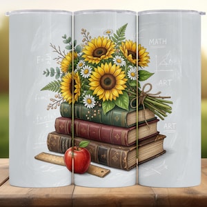 May include: A white tumbler featuring a stack of books, a red apple, and a ruler. A bouquet of sunflowers and daisies rests on top. The background has math and art equations.
