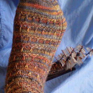 SCYLLA - sock knitting pattern - toe-up and perfect for variegated yarns