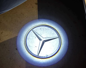 2X Luces de proyector de cortesía de bienvenida para Mercedes Benz: Ultra HD, sin decoloración, garantía de 3 años.