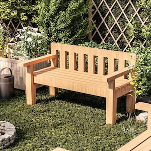 May include: A wooden bench with a slatted back and armrests sits on a grassy lawn in a garden setting. The bench is made of natural wood and has a rustic look.