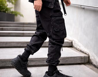 Normale pasvorm zwarte techwear cargobroek: polyester tactische joggingbroek met meerdere zakken