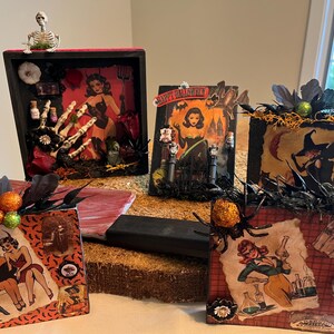 Vintage Halloween-pin-upkunst: handgemaakte ephemera en versieringen