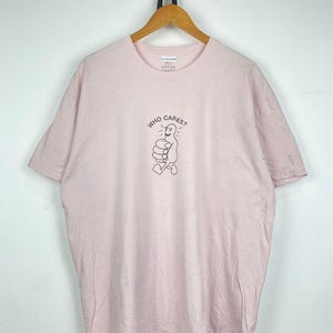 Rex Orange County Wen kümmert das? T-Shirts DO490
