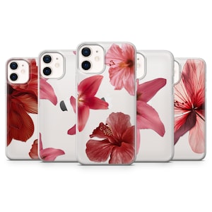 May include: Several clear phone cases adorned with vivid red and pink floral patterns. The cases display different flower types, such as hibiscus, against a transparent backdrop. The floral designs are intricate and visually appealing.