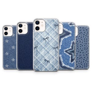 May include: Five phone cases with a denim effect. Designs include a dark blue solid, a light blue plaid with bows, a distressed star, and two with star patterns. The cases are designed to fit a smartphone.
