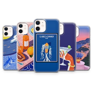 May include: A collection of five phone cases with various designs. One case features a blue background with a boat illustration and the text "LAKE COMO ITALY". Other cases display images of a cocktail, fruit, and a coastal scene.