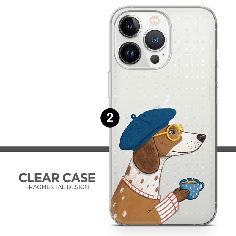 May include: Clear phone case featuring a whimsical illustration of a dog wearing a blue beret and yellow glasses, holding a blue polka-dot mug. The case has the text "CLEAR CASE FRAGMENTAL DESIGN".