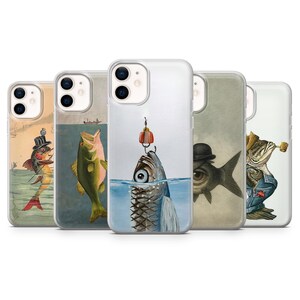 May include: A collection of phone cases featuring whimsical illustrations of fish. Each case showcases a unique design, including fish with hats, fishing hooks, and surreal eye imagery. The cases are clear, allowing the phone's color to show through.