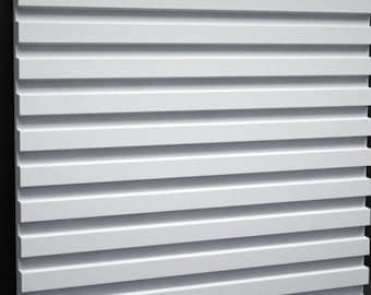 May include: White wall panel with a horizontal grooved design. The panel is made of a smooth, white material and has a modern, minimalist look.
