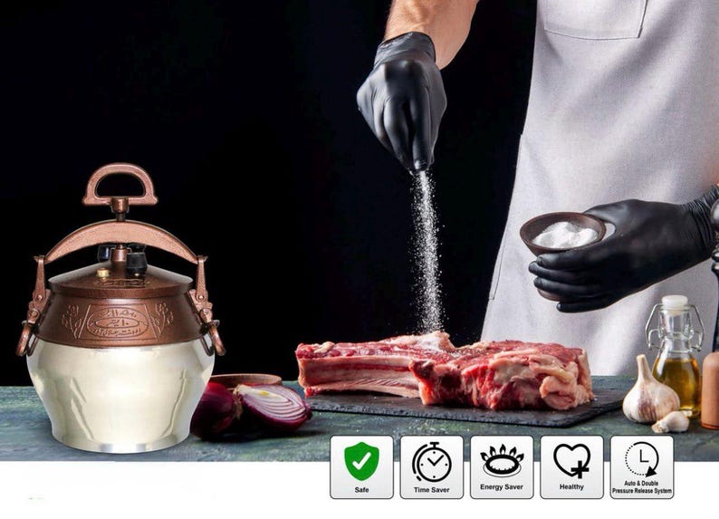 May include: A copper and white pressure cooker with a handle is displayed next to raw meat being seasoned with salt. The image also includes garlic, oil, and a halved red onion. Icons indicate safety, time-saving, and energy-saving features.